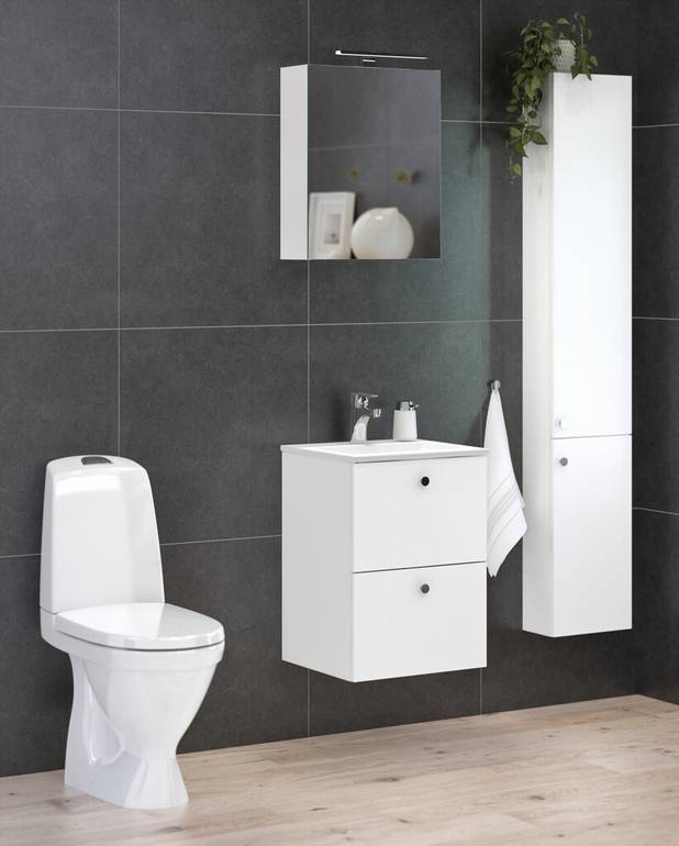 Toilet Nautic 1500 - hidden S-trap, Hygienic Flush - Easy-to-clean and minimalistic design
With open flush edge for simplified cleaning
Low flush button with a neat design