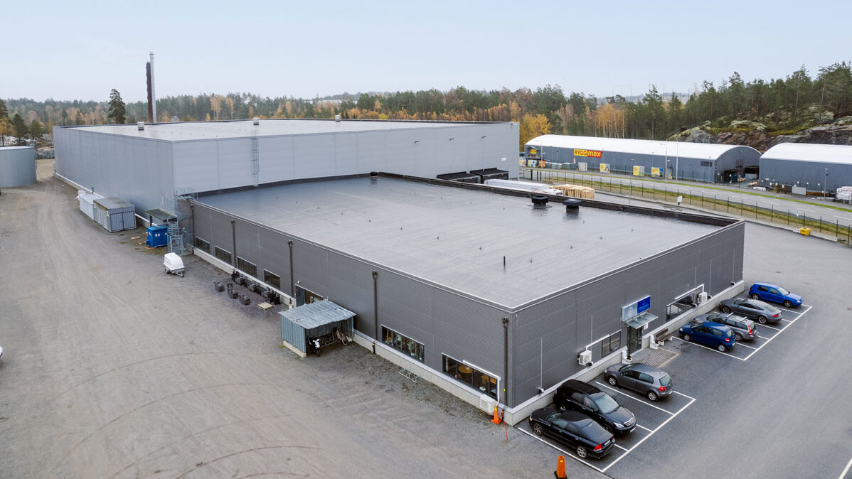 A new, large, gray industrial production plant in Gustavsberg.