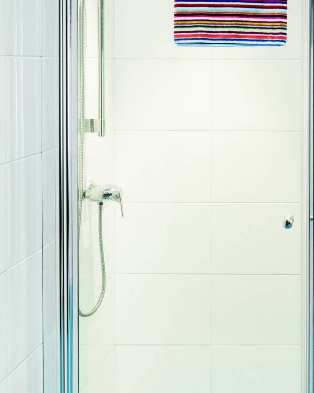 Shower mixer Nautic - single-lever - Adjustable comfort flow can be activated as needed
Adjustable max temperature for increased scald protection
Can be adjusted for universal accessibility with extended lever