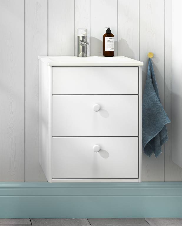Bathroom cabinet Graphic - 45 cm - All-covering porcelain sink
Hidden compartment for storing small things 
The fold out compartment provides extra shelf space
