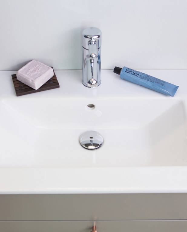 Bathroom sink for vanity unit Graphic - 80 cm - Shallow depth for more space in the bathroom
For mounting on Graphic furniture
Made from hygienic, durable and densely sintered sanitary ware