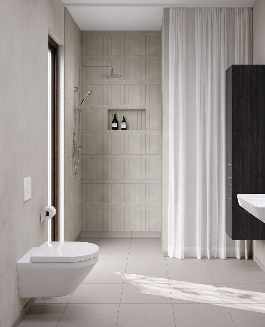 White wall-hung toilet in a beige bathroom