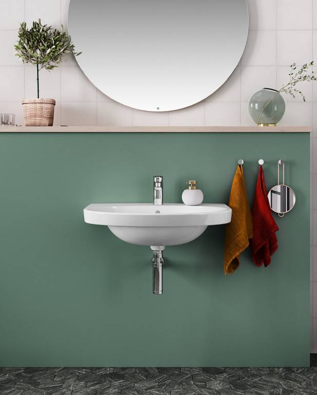 Bathroom sink Nautic 5560 - for bolt/bracket mounting 60 cm - Easy-to-clean and minimalist design
Elliptical sink with generous counter spaces
Ceramicplus: fast & environmentally friendly cleaning