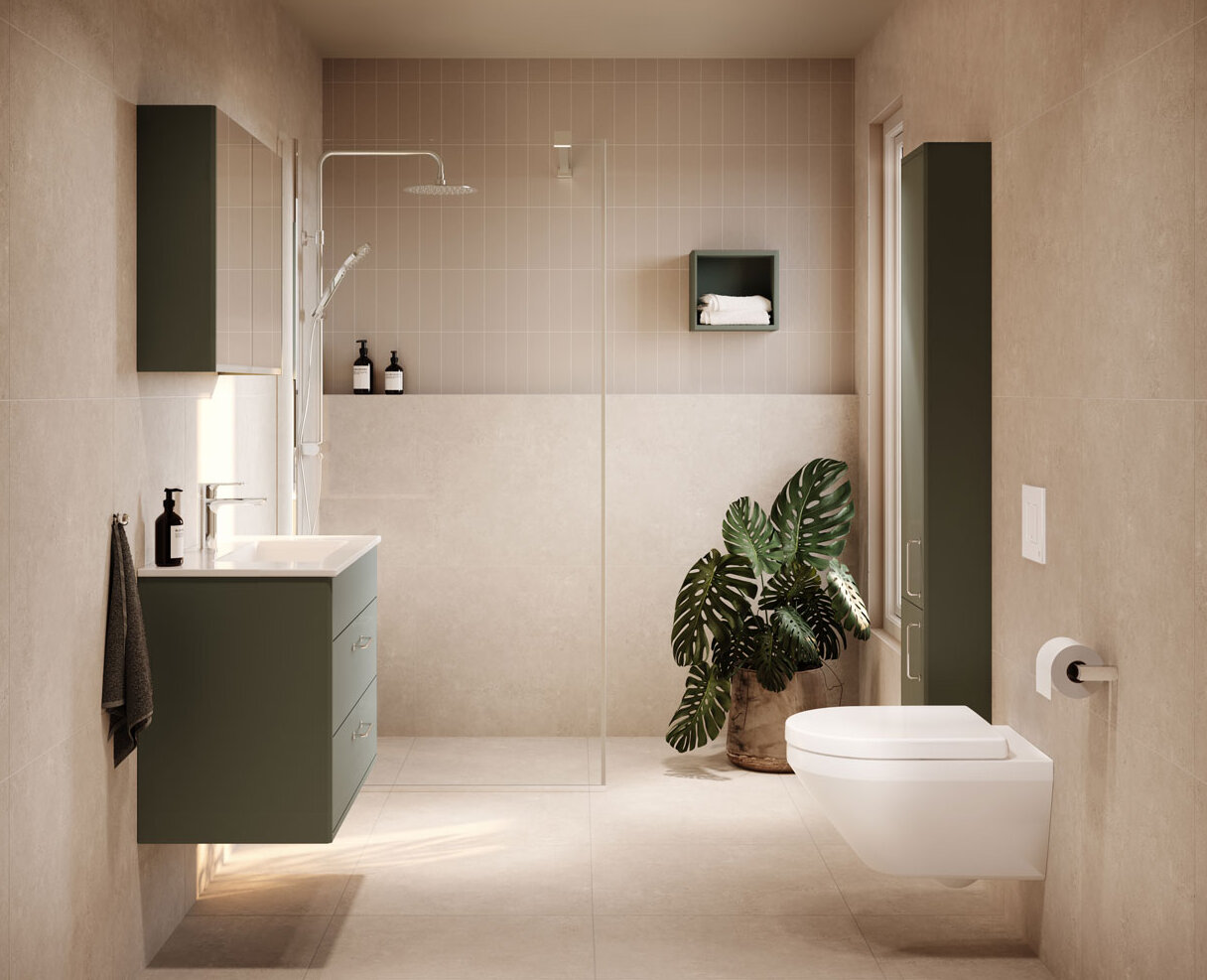 Minimalistisk bad med beige fliser, grønne skap, dusjkabinett og et vegghengt toalett med Hygienic Twist-spyling.