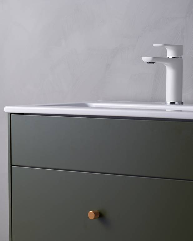 Bathroom cabinet, Graphic – 80 cm - Compact depth – to make space even in a small bathroom
Drop-down ‘secret compartment’ for storing small items
Space to install an electrical socket