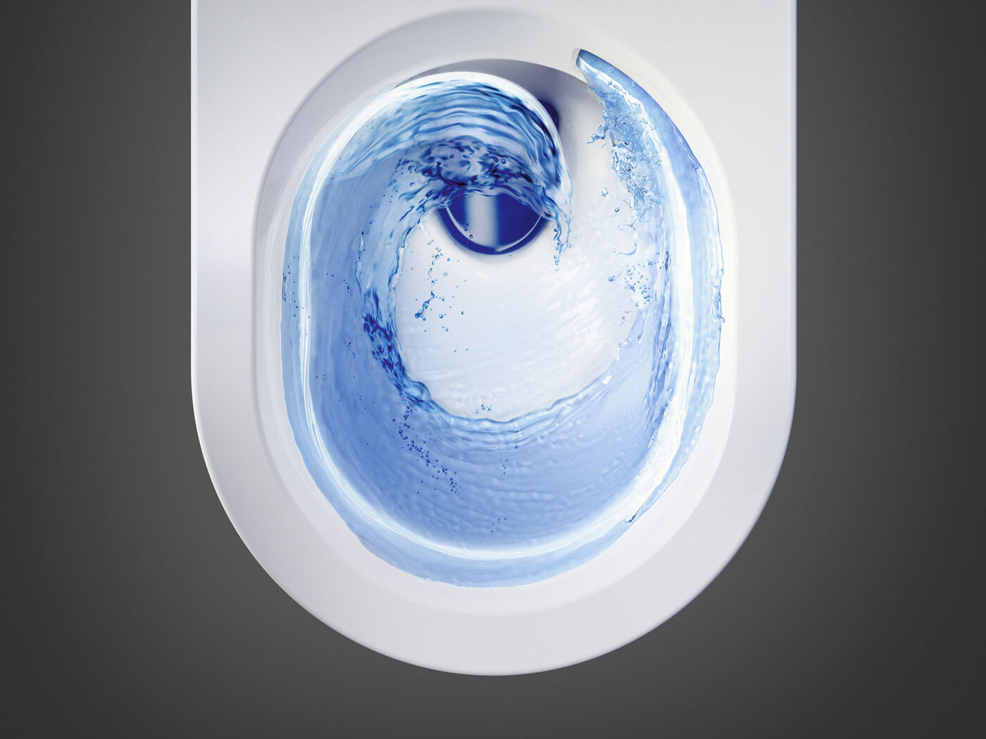 Toiletsæde set ovenfra med skylning, der skaber hvirvler i vandet.