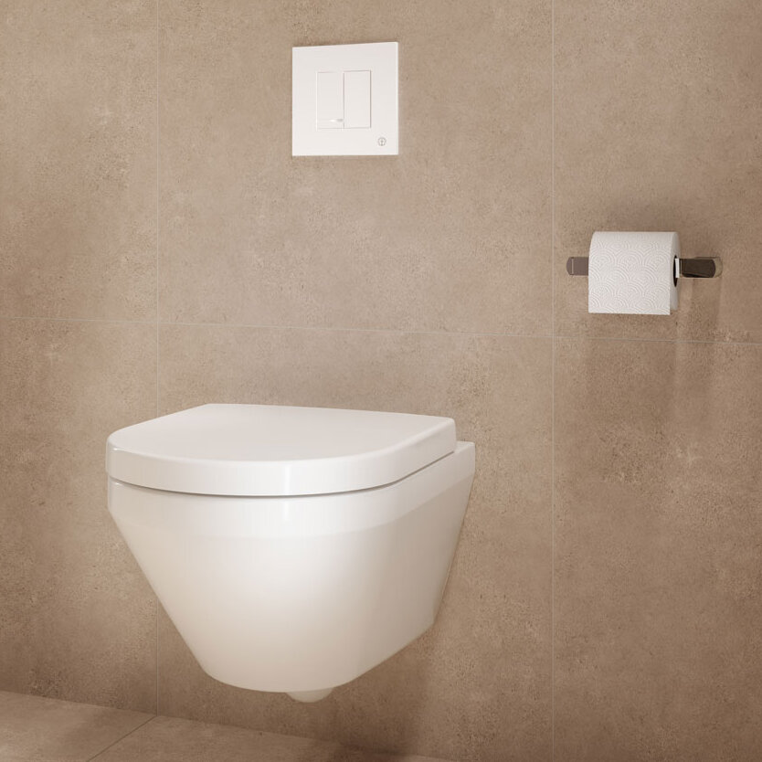 A modern wall-mounted white toilet with a green storage cabinet and toilet paper holder on a beige wall.