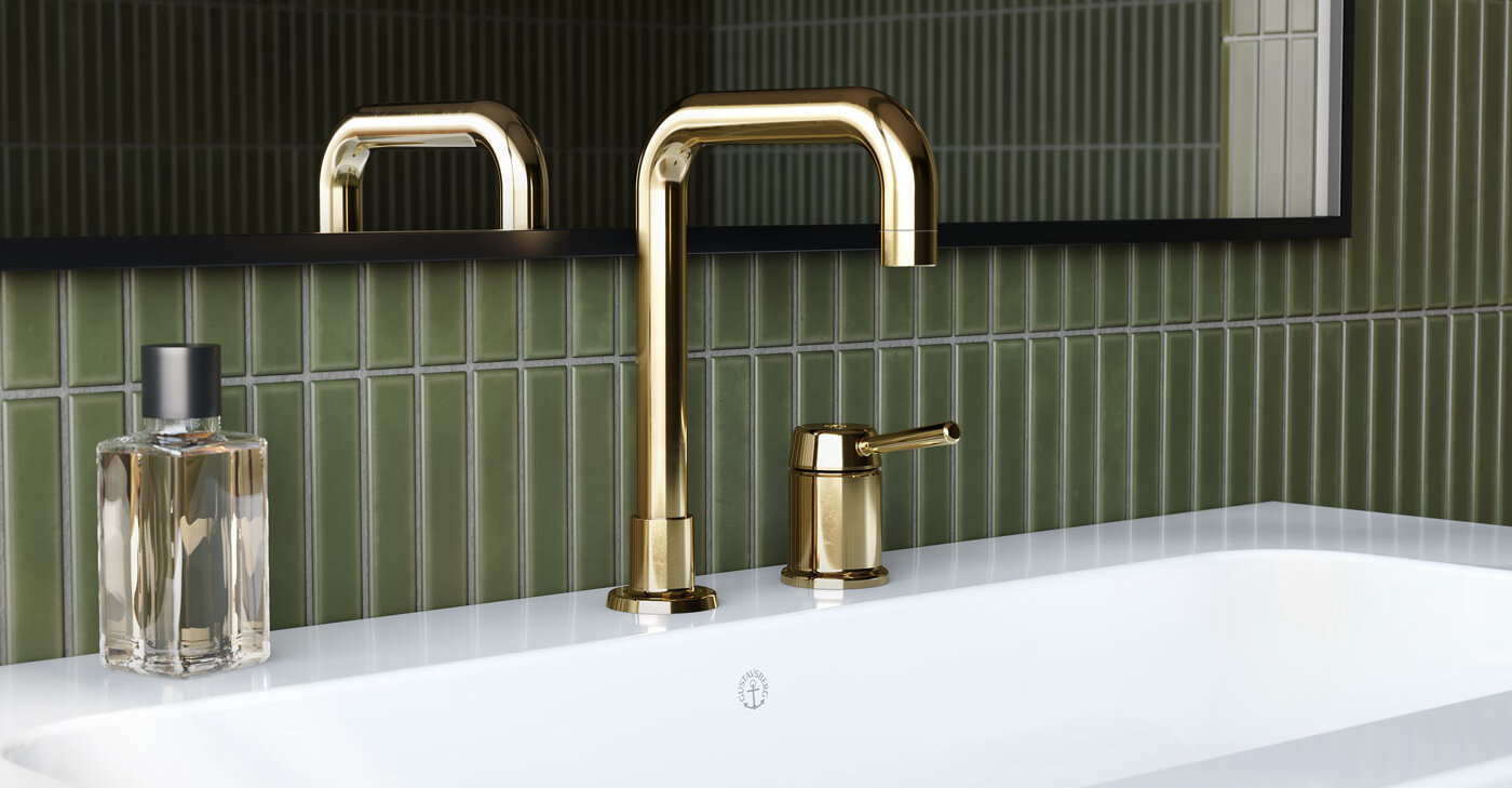 Two-hole basin mixer Ducentic in brass, white basin and commode in black oak.