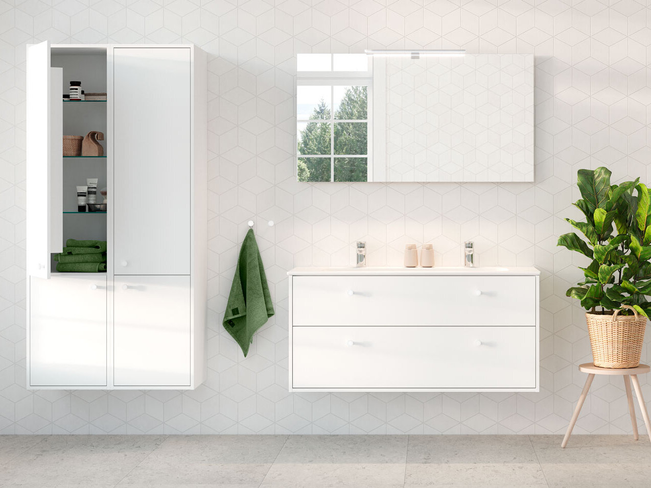 Ett vitt badrum med produkter från Gustavsberg