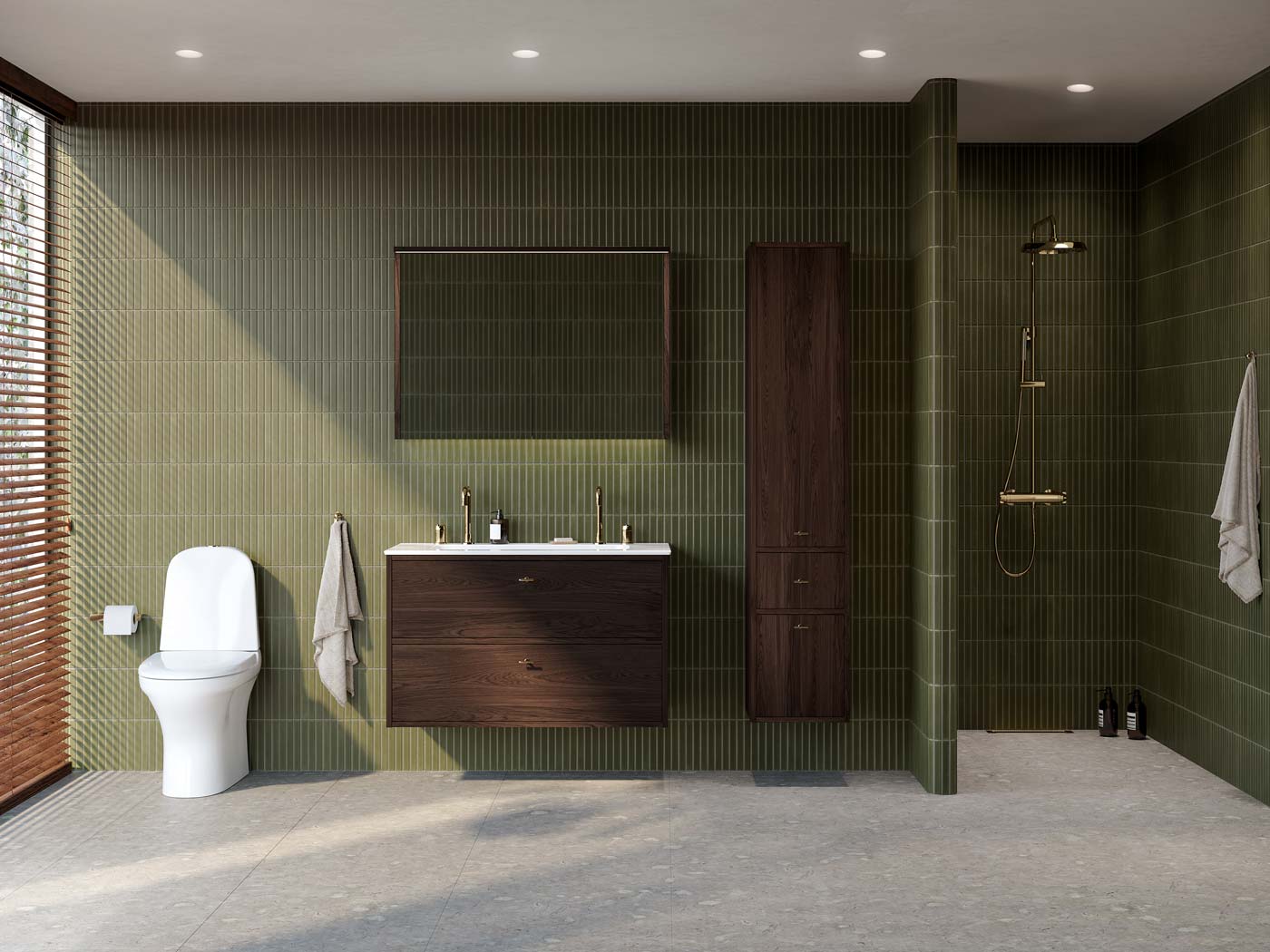 Baderom innredet med Ducentic-møbler i mørk eik - kommode og høyskap - og servantbatteri og dusj i messing.