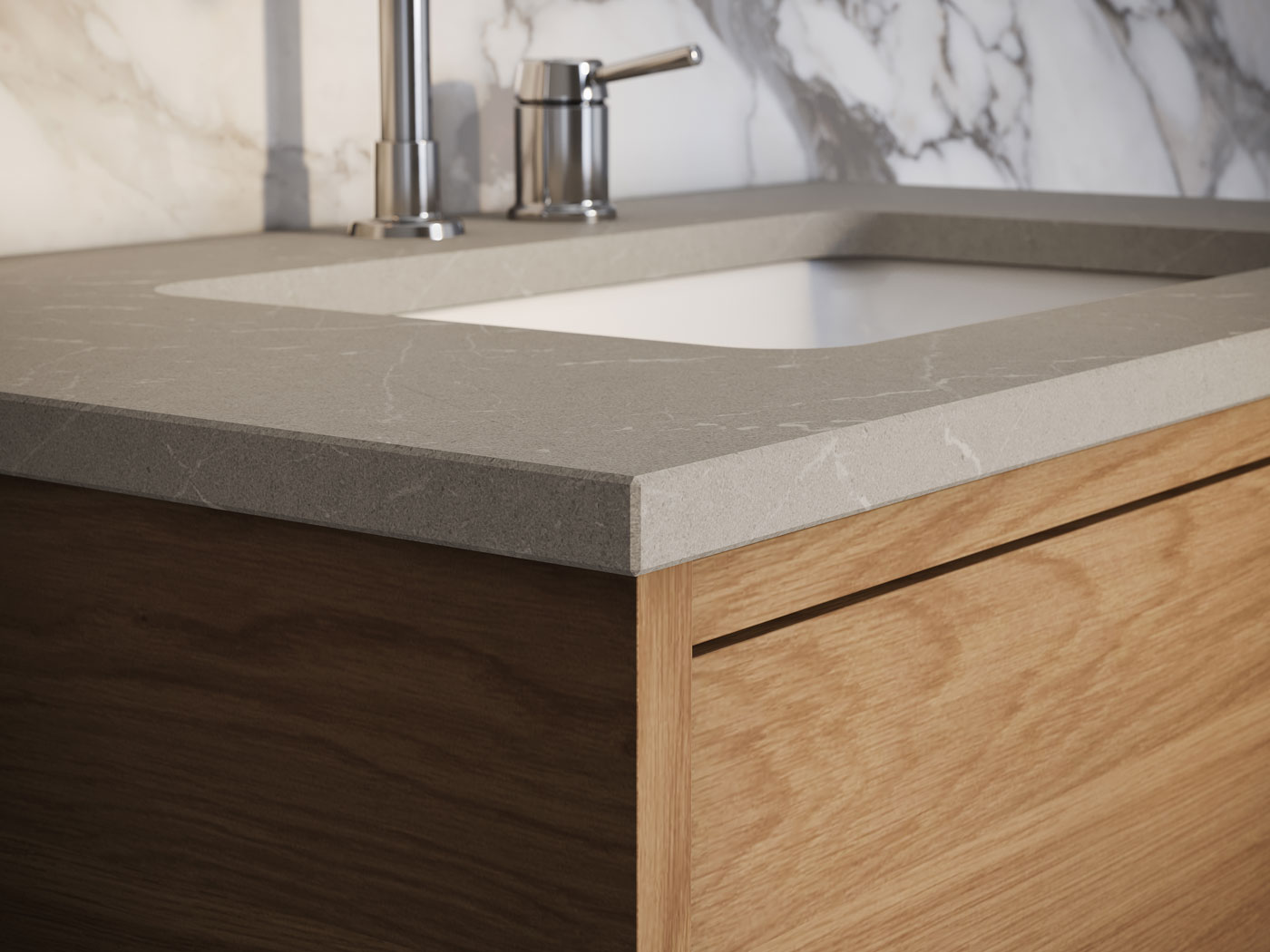 En badrumskommod, Ducentic, i ljus ek med en bänkskiva i grå sten, integrerat handfat och en tvåhålsblandare i krom.